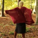 Long mesh cardigan dark red. Long boho cardigan in net look with wide batwing sleeves.