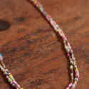 Multicolored eyelet cord