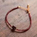 Fine bracelet with the red gemstone garnet gold plated